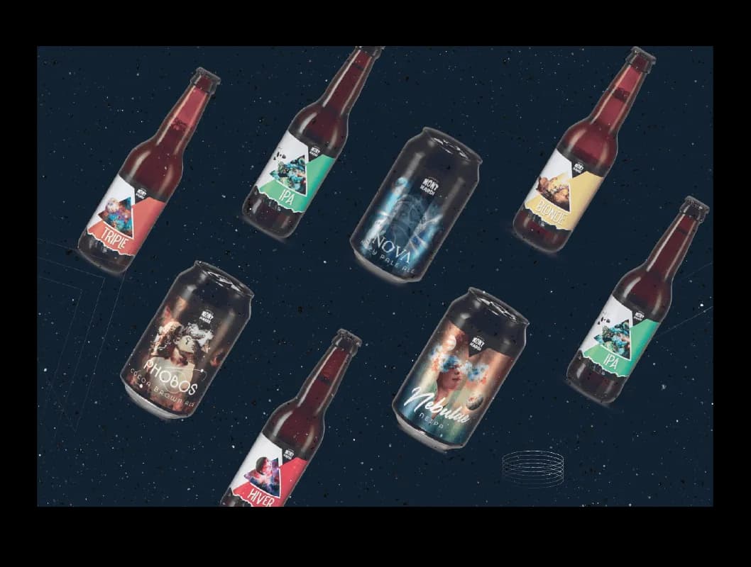 A diagonal arrangement of craft beer bottles and cans with diverse artistic labels.